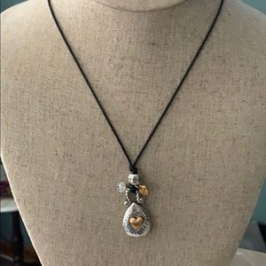 Brighton leather cord charm necklace.